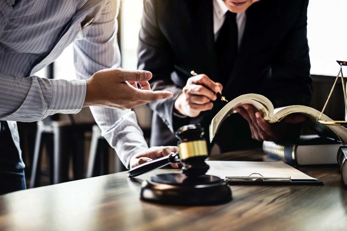 Lawyers discussing a dispute over documents