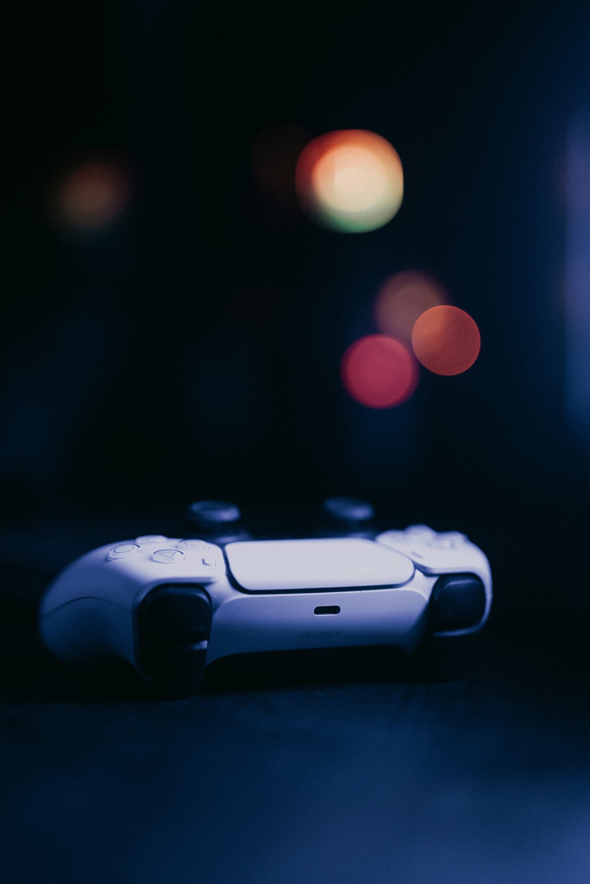 A game controller in low navy light